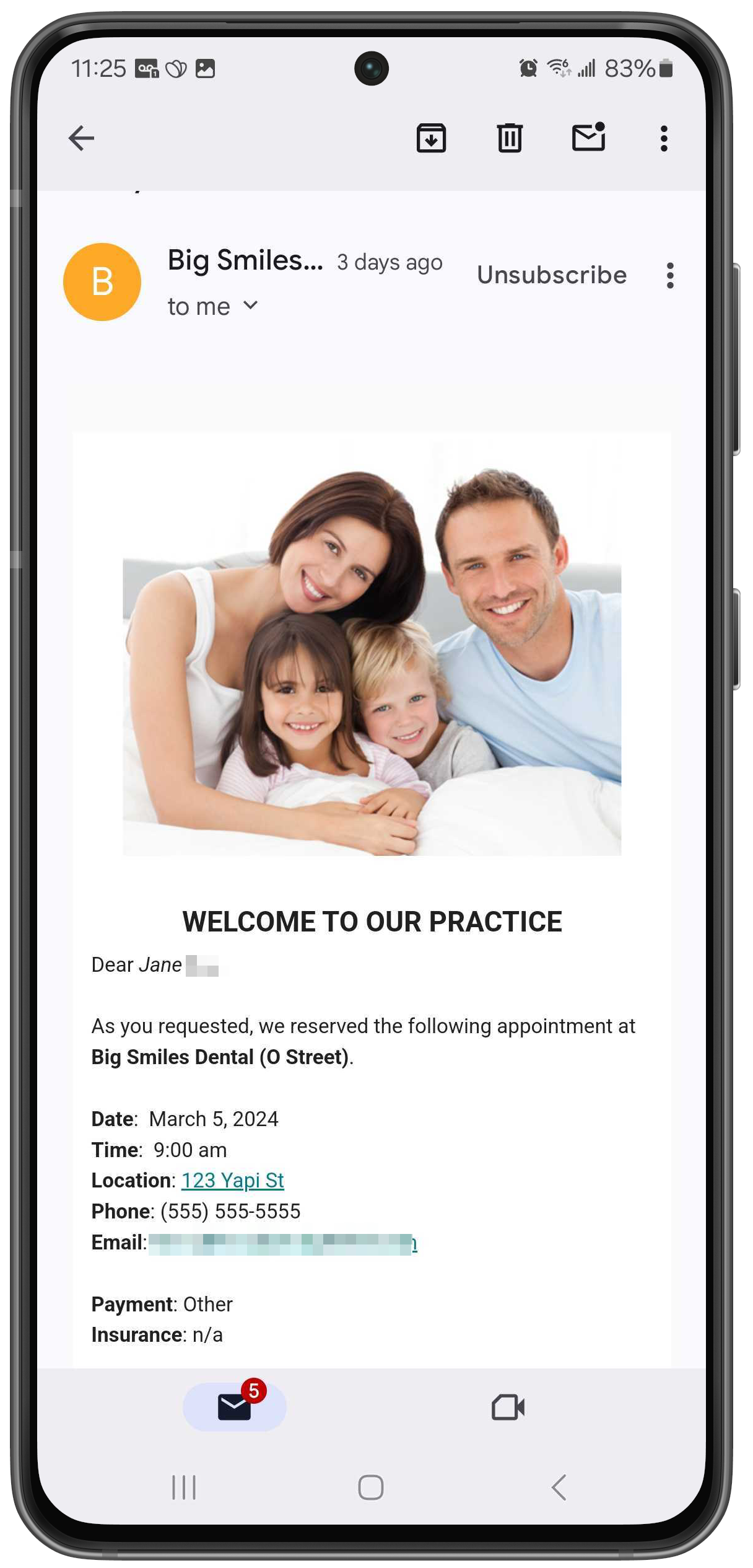 Phone with patient's confirmation email showing details of the appointment they booked.
