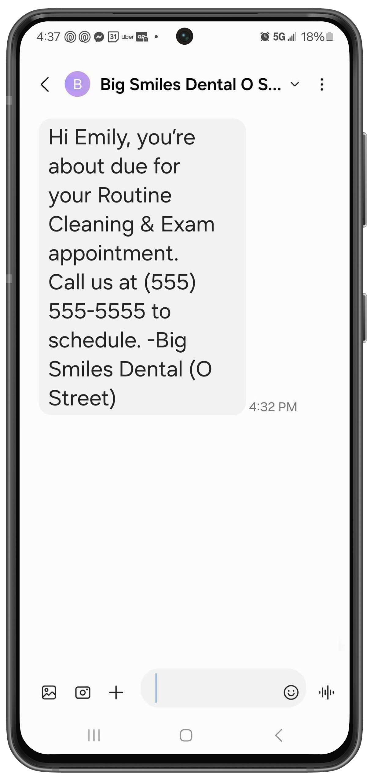 Phone with a text letting a patient know they're almost due for an appointment and and lists the practice name and phone number.