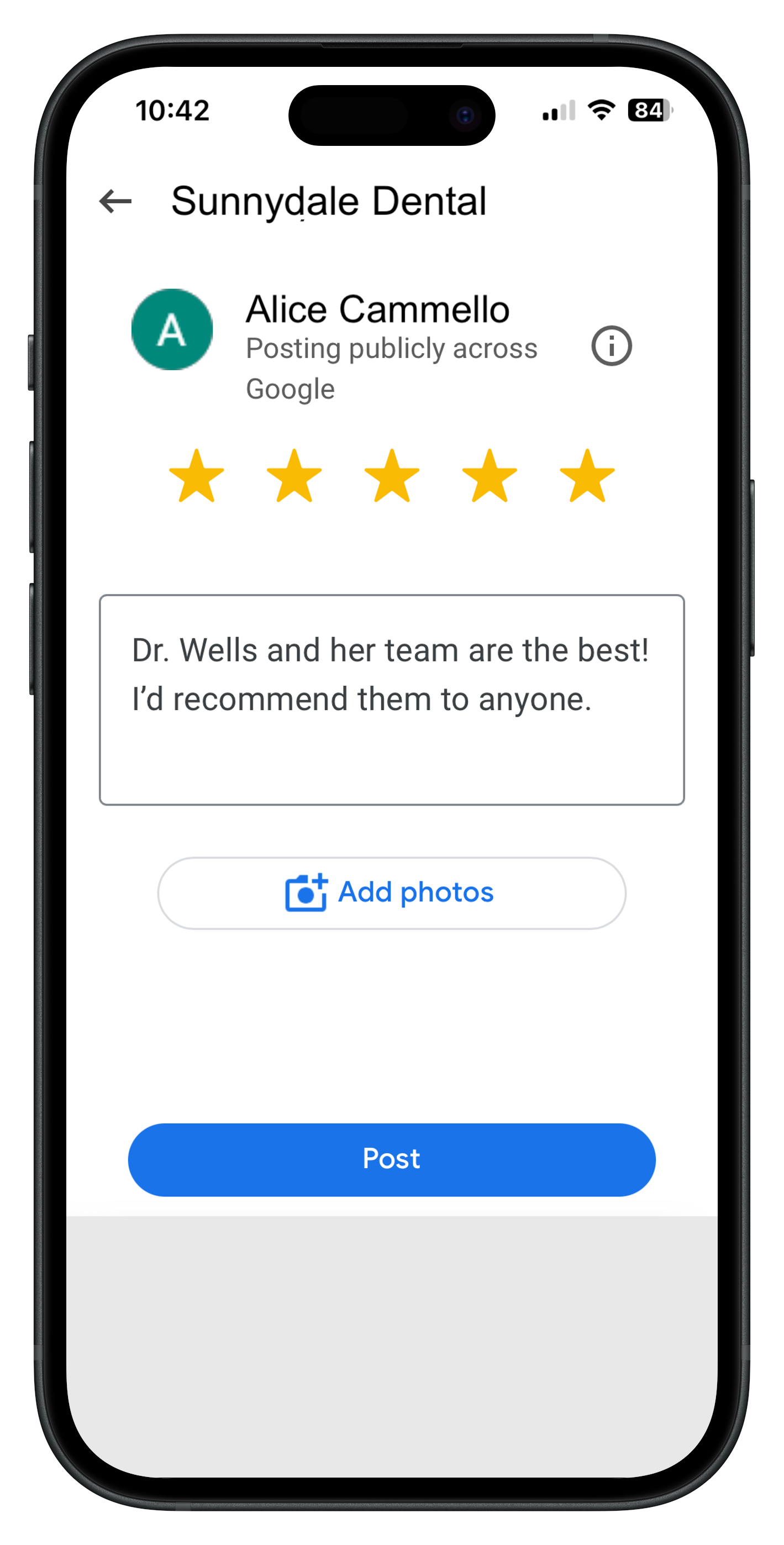 A cell phone with a practice's Google Reviews page open with a draft of a patient review in progress.