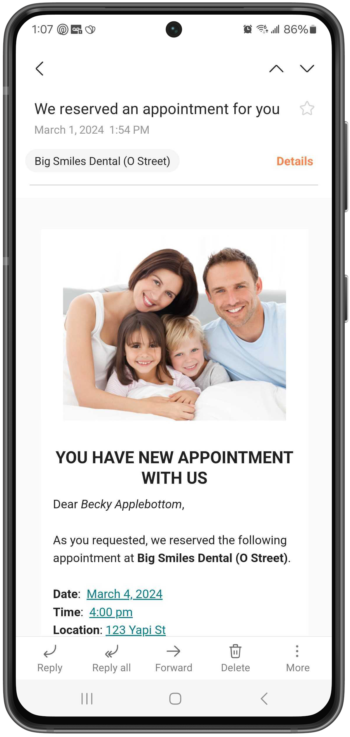 Phone with patient's confirmation email showing details of the appointment they booked.